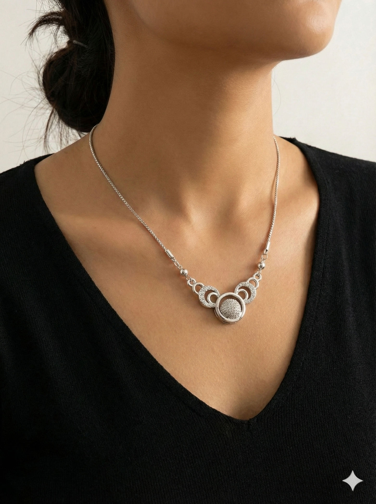 Elegant Triple Ring Silver Necklace with Shimmering Crystal Ball Pendant